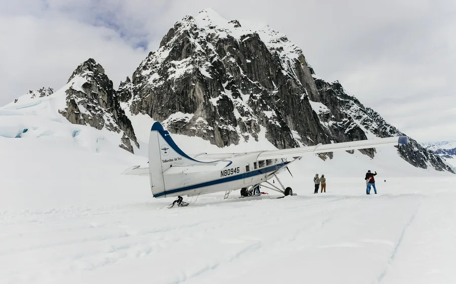 A light aircraft on a snowfield in the Alaska Range near Talkeetna